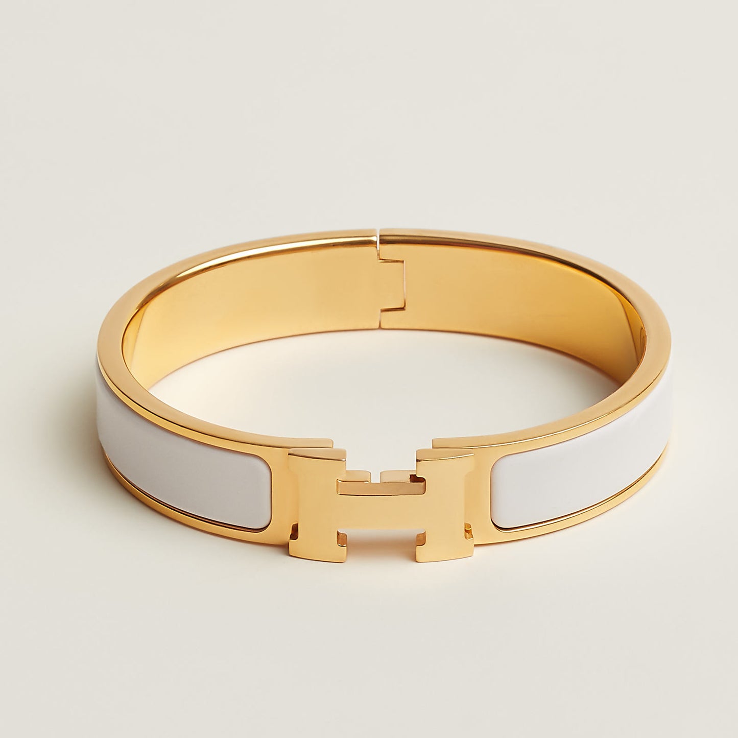 Hermes bracelet size 19 gold and white